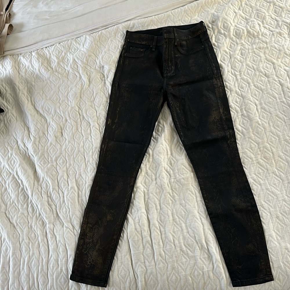 Seven for all mankind in a black and gold almost foil like texture, size 26